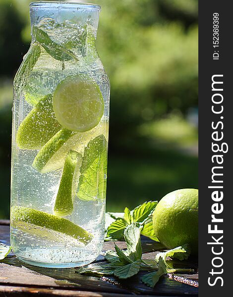 A whirl of mint and lime in a bottle with homemade mojito cocktail