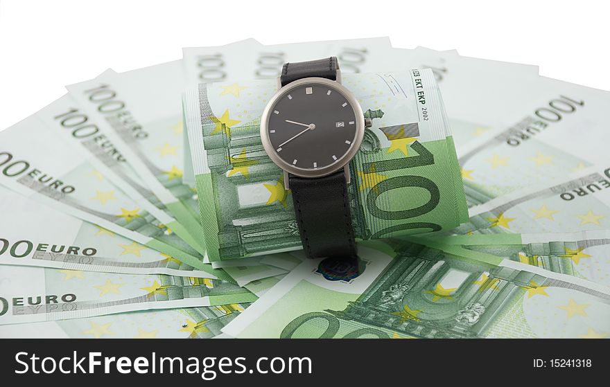 Time is money. Watch and 100 euro banknotes isolated on a white background. Time is money. Watch and 100 euro banknotes isolated on a white background.