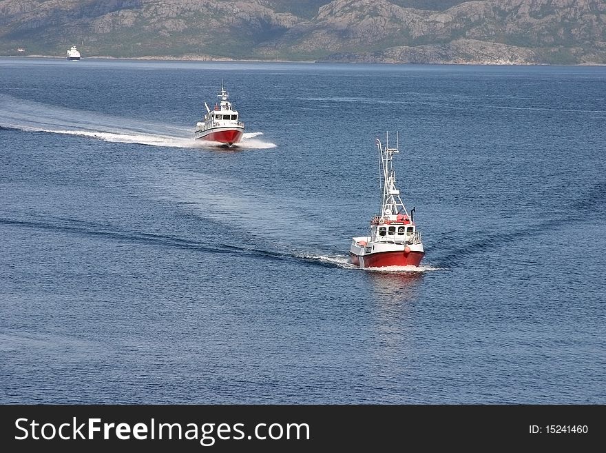 Boat traffic close to a harbour in Norway.