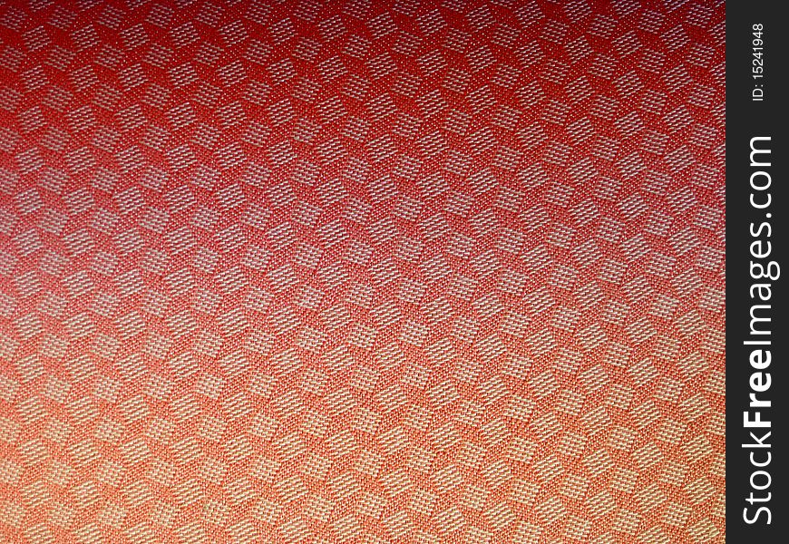 Texture of red fabric background closeup