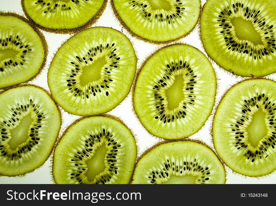 Slices of kiwi isolated over the white background