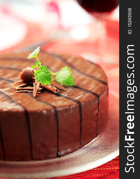 Nut cake glazed with chocolate icing - detail. Nut cake glazed with chocolate icing - detail