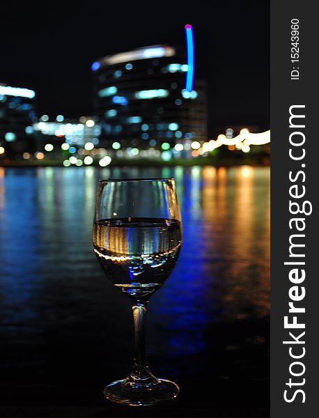 Reflection of the skyline in a wine glass. Reflection of the skyline in a wine glass