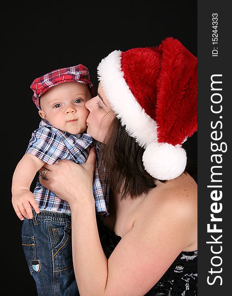 Beautiful caucasian mother and son celebrating christmas. Beautiful caucasian mother and son celebrating christmas