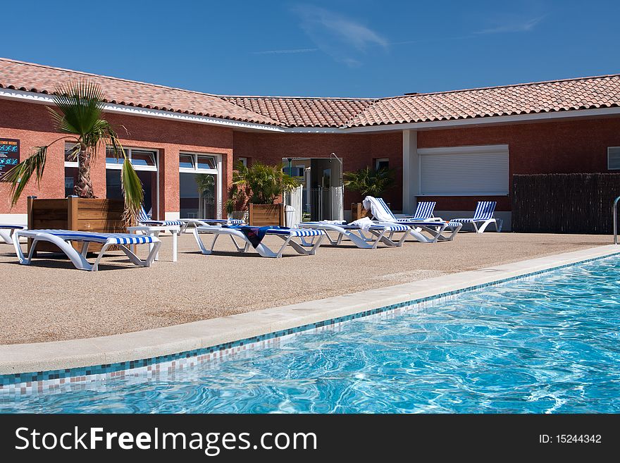 Swimming pool under the open sky. Villa or hotel. Swimming pool under the open sky. Villa or hotel