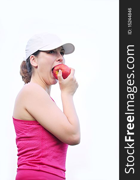 Girl after recreation in the countryside and eating an apple. Girl after recreation in the countryside and eating an apple