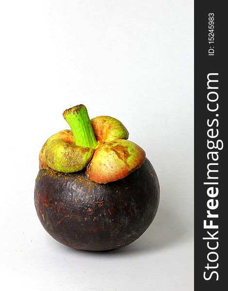 Tropical fruit - Mangosteen (Garcinia mangostana)on white background
