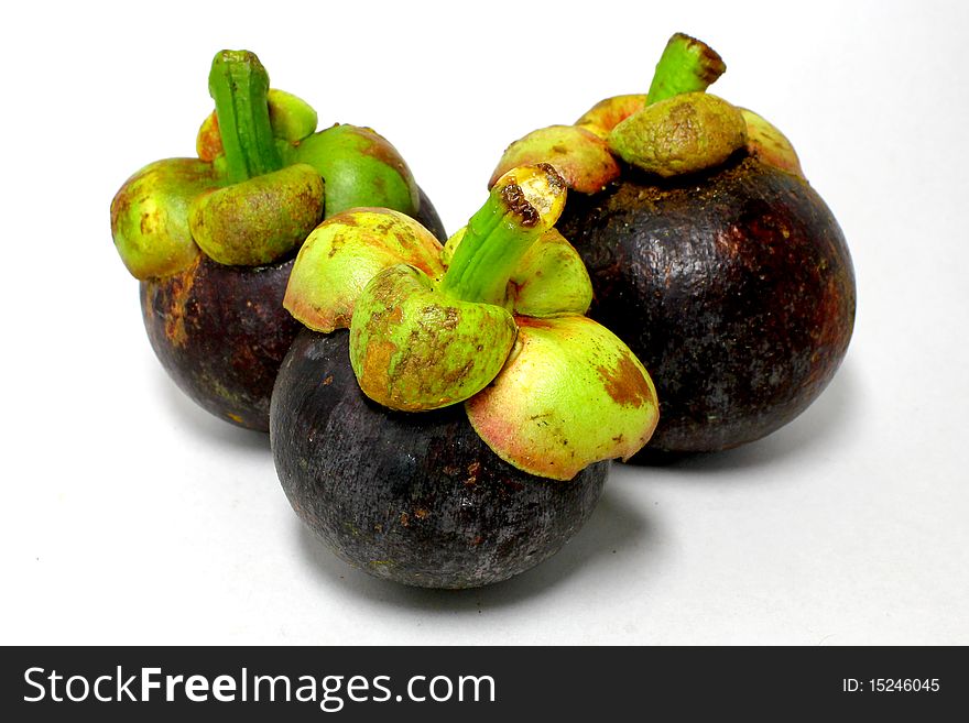 Tropical fruit - Mangosteen (Garcinia mangostana)on white background