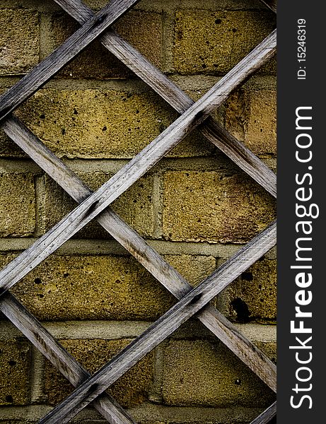 Abstract brick wall with old wood graph covering. Abstract brick wall with old wood graph covering