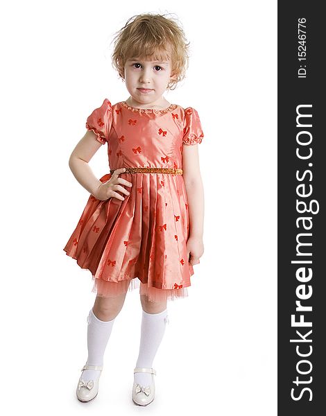 The little girl in dressing-up dress full Length. On a white background. The little girl in dressing-up dress full Length. On a white background.