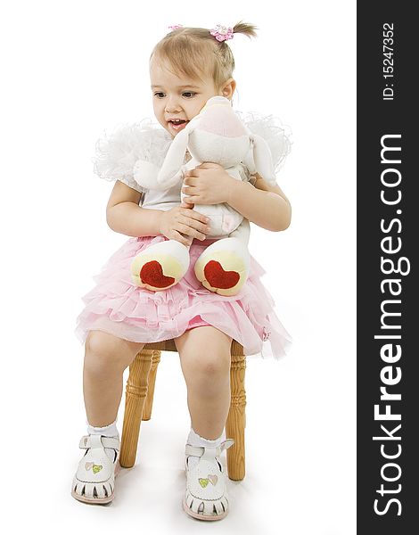 Portrait of  sitting little girl isolated on white. Portrait of  sitting little girl isolated on white.