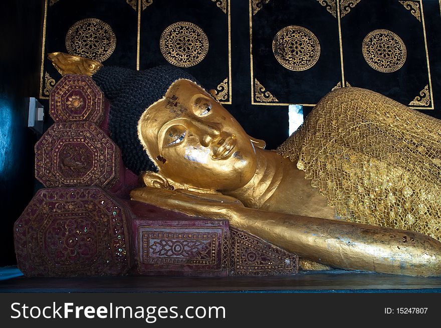 Gold buddha image in thai temple