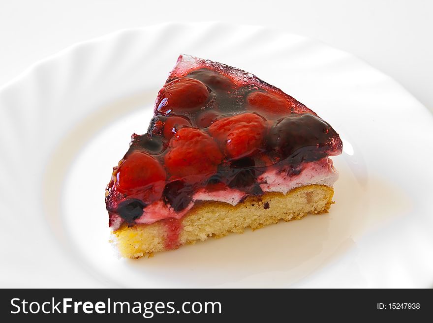 Peice of cake with balckberry, raspberry on plate Background. Peice of cake with balckberry, raspberry on plate Background