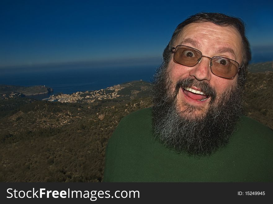 Photo of a tourist having fun in a mountain and sea scene. Photo of a tourist having fun in a mountain and sea scene.