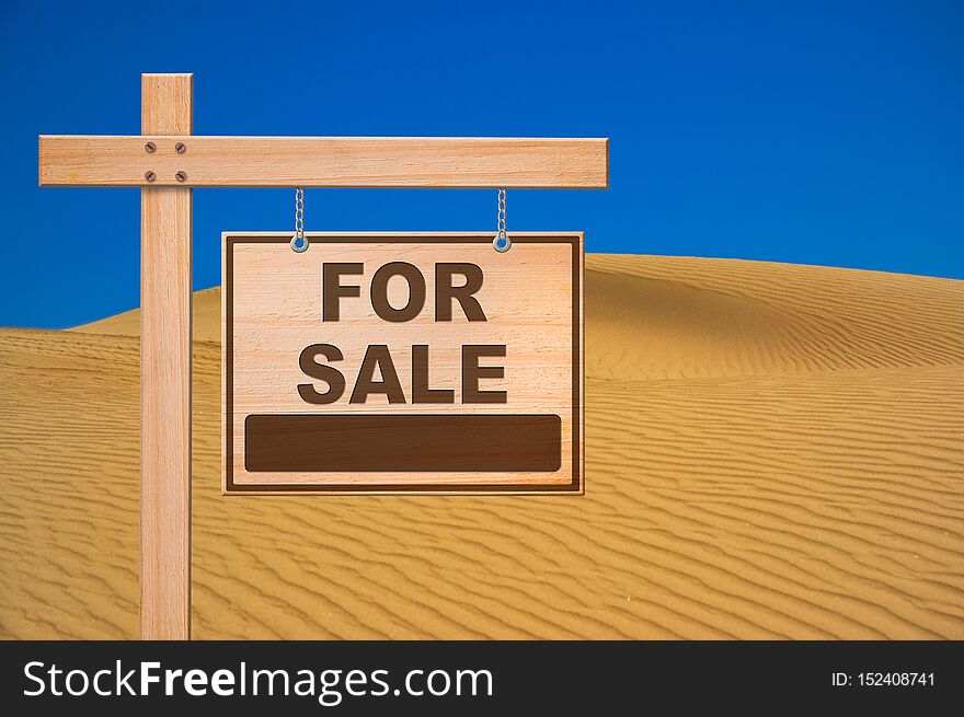 Sale sign in the desert, blue sky, copy space.