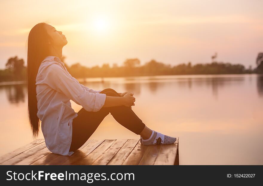 Lonely woman sad sunset background