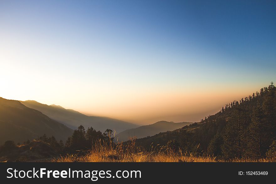 Early morning light at the top of Poon Hill, overlooking the full Annapurna Mountain range. Early morning light at the top of Poon Hill, overlooking the full Annapurna Mountain range