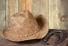 Western Scene With Cowboy Hat And Horseshoes Royalty Free Stock Photography Western Scene With Cowboy Hat And Horseshoes Royalty Free Stock Photography