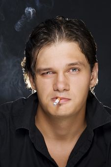 Man Smoking A Cigarette Royalty Free Stock Photo