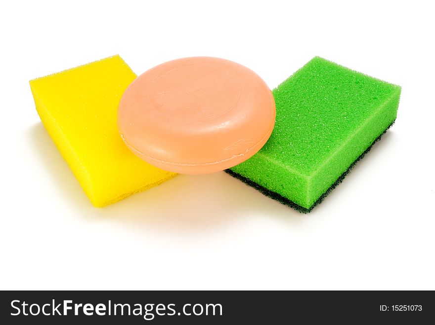 Soap and two washcloths on a white background