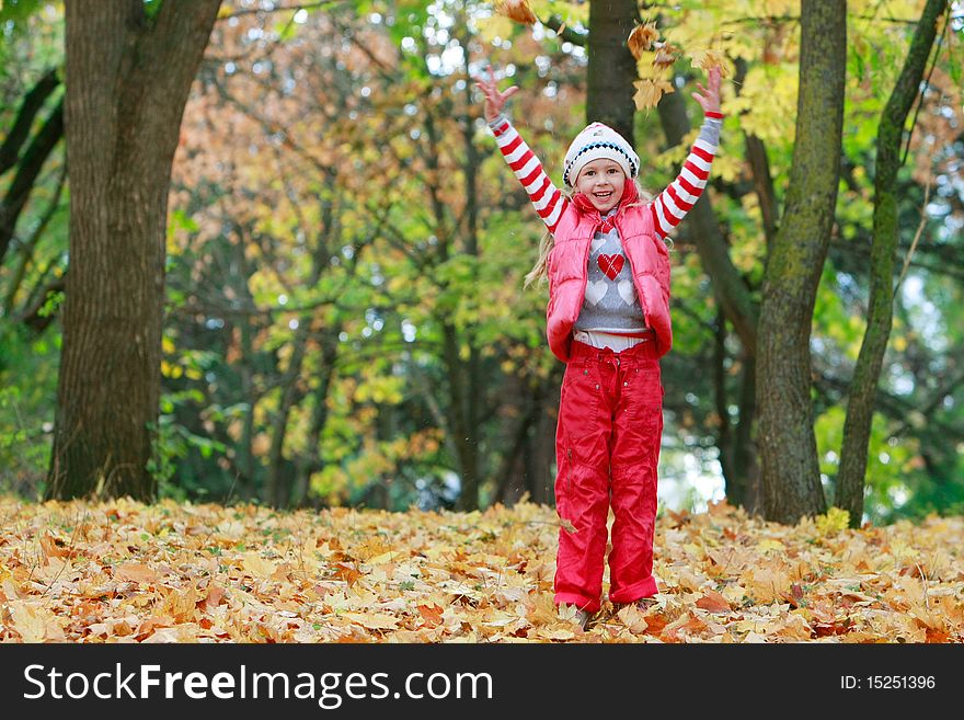 Young Happy Girl In Autumn Park