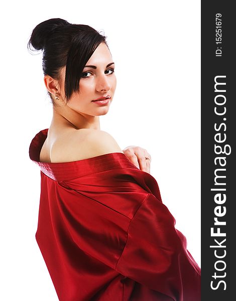 Picture of charming young woman in red gown on white background.