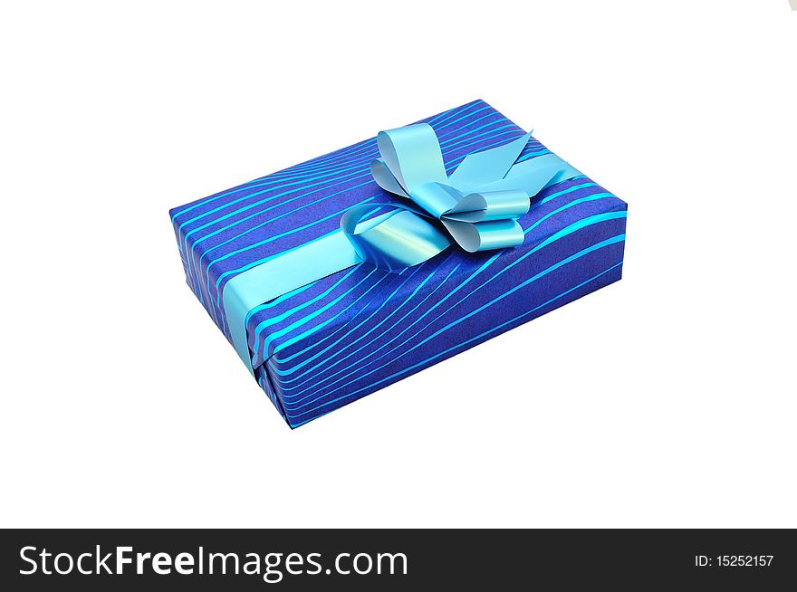 Isolated blue gift with a bow and ribbon. Isolated blue gift with a bow and ribbon