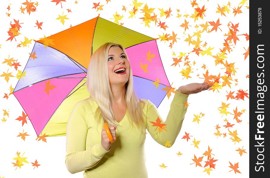 Portrait of pretty autumn woman standing under umbrella during leaf fall. Portrait of pretty autumn woman standing under umbrella during leaf fall