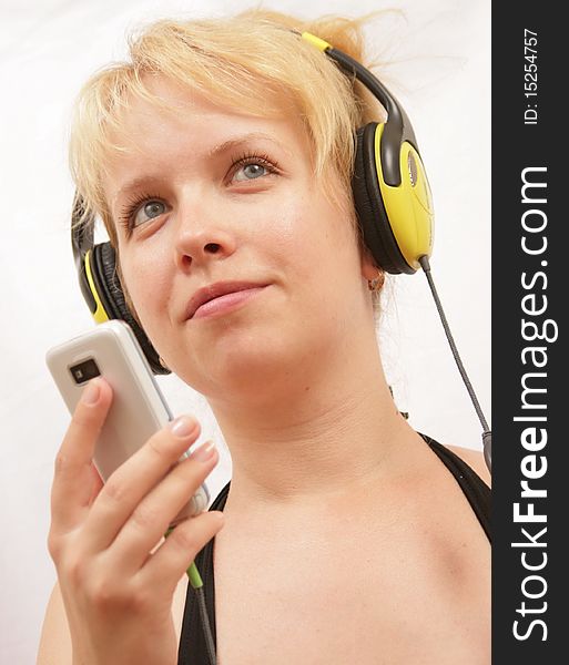 blond girl with player and headphones