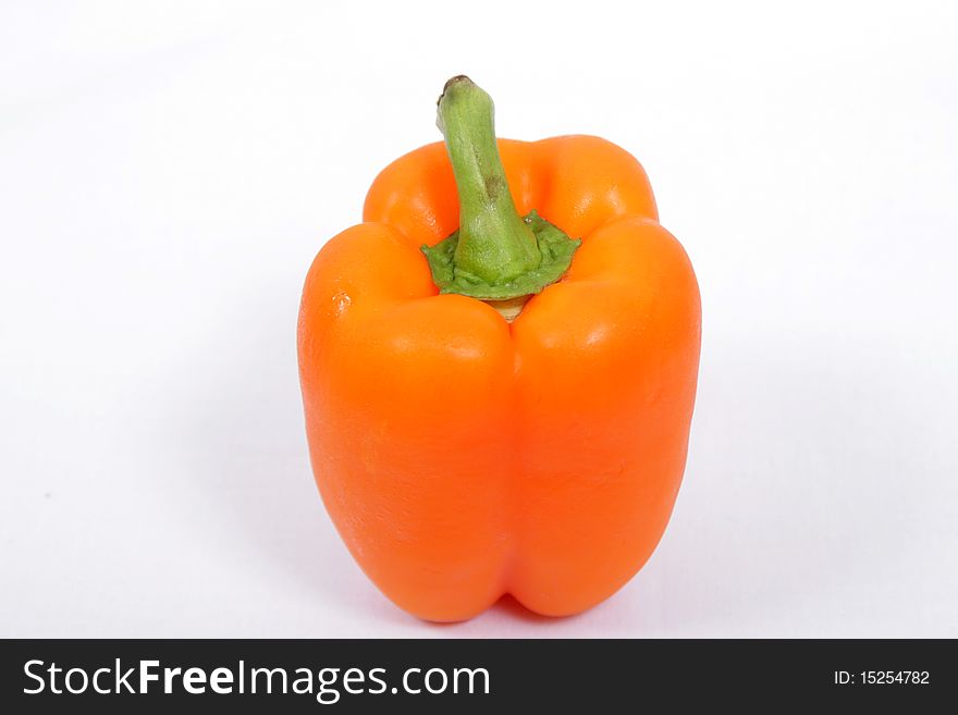 Orange paprika isolated on white