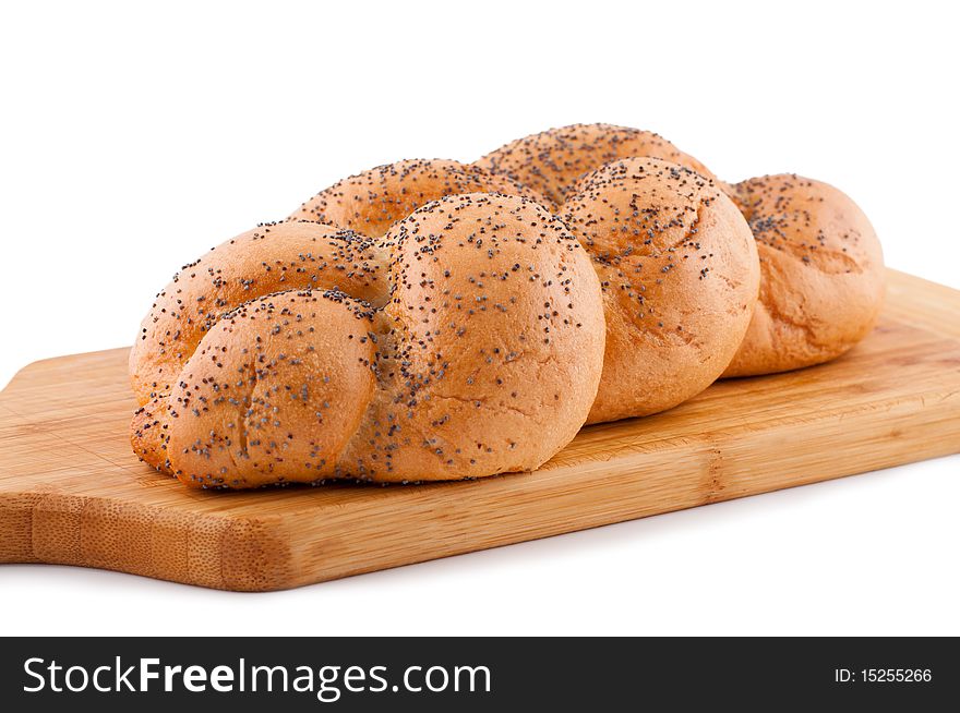 Bread roll with poppy white background. Bread roll with poppy white background.