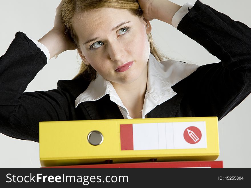 Portrait of businesswoman with folders