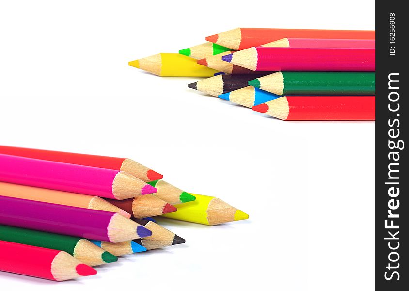 Close up of color pencils with different color over white background.