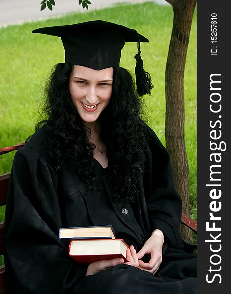Smiling Caucasian Student With Books