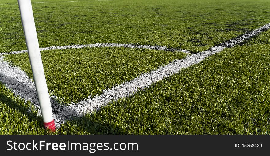 Corner kick in a plastic grass soccer field