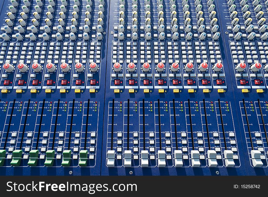 Big mixer console in a concert stage