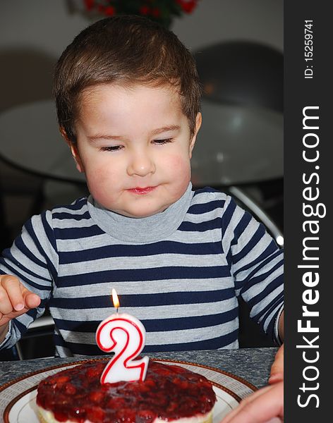 Little boy with birthday cake