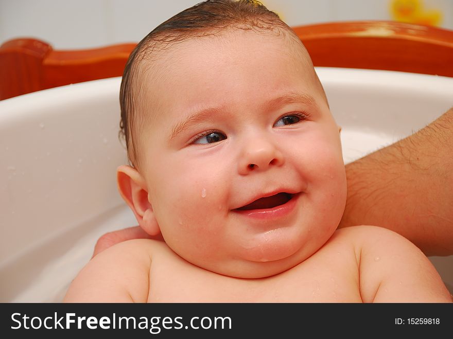 Cute Smiling Baby-boy In Bath Tub