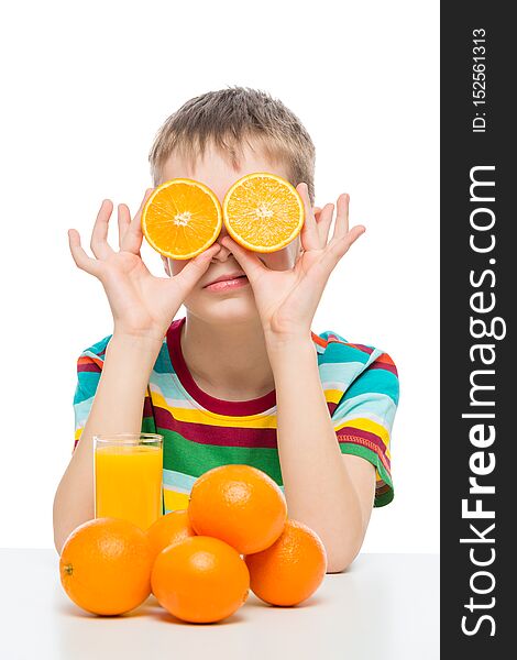 humorous photo of a boy with oranges and fresh juice on a white background