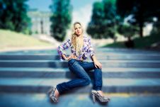 Blonde Young Woman Sitting On Stairs In The Park Stock Images Blonde Young Woman Sitting On Stairs In The Park Stock Images