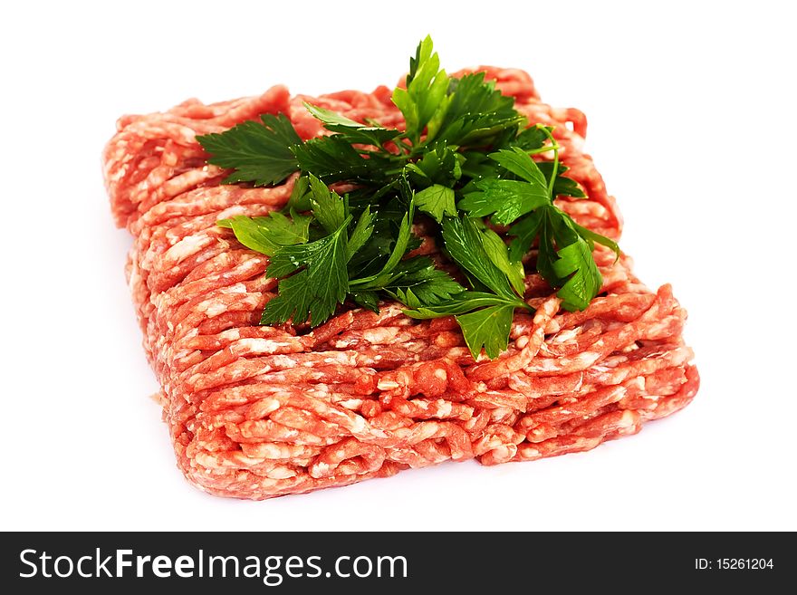 Shot of some minced meat with parsley, isolated on white background