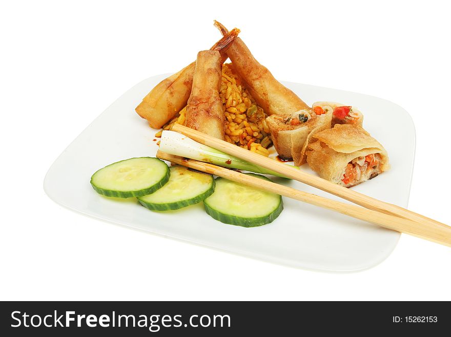 Chinese snacks, prawns and spring rolls on a plate. Chinese snacks, prawns and spring rolls on a plate