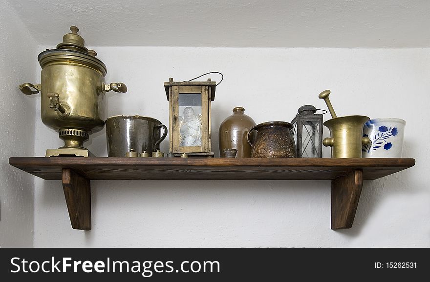 Old shelf with a different vintage crockery