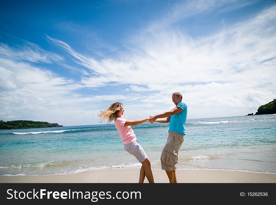 Couple having fun at seaside. Couple having fun at seaside