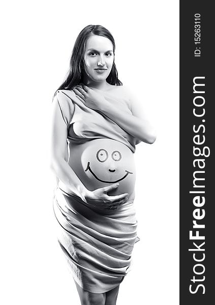 Pregnant woman with smile on her stomach