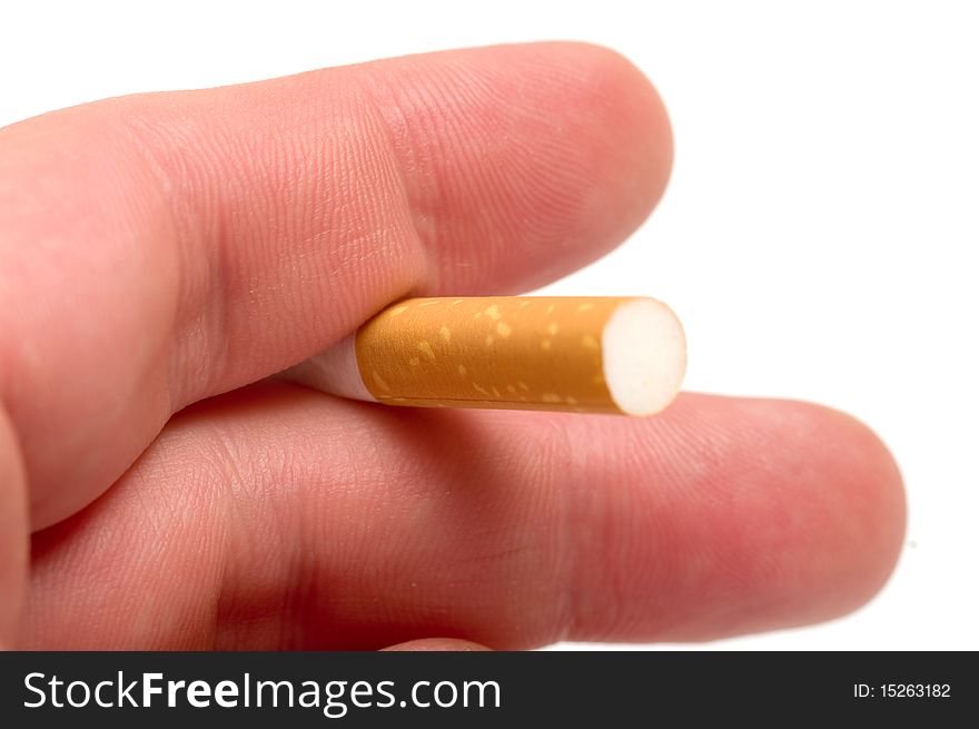 Closeup of hands holding a cigarette isolated on a white background. Closeup of hands holding a cigarette isolated on a white background.