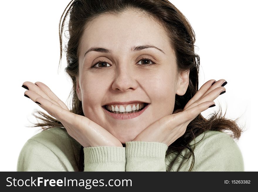 Happy young woman smiling headshot with friendly look, hands on the chin. Happy young woman smiling headshot with friendly look, hands on the chin