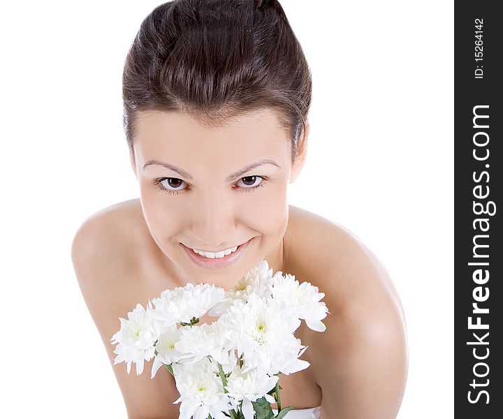Beautiful portrait of a young sexy woman with a white flower.