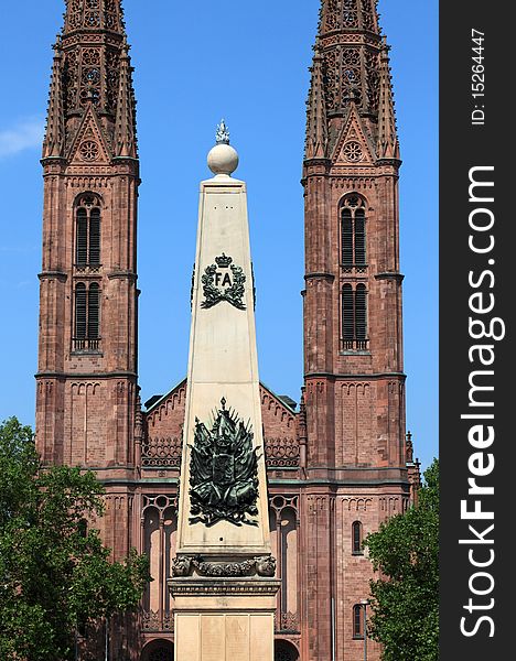 The Bonifatiuskirche and the Waterloo Obelisk in Luisenplatz, Wiesbaden, Germany.