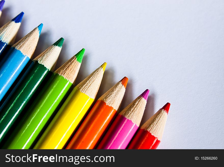 Row of rainbow colored pencils